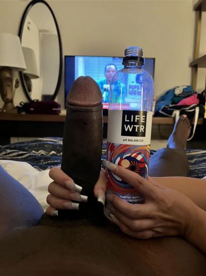 Pornstar Louie smalls cock compared to water bottle